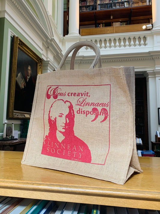 Large jute tote bag with a red printed illustration of Linneaus