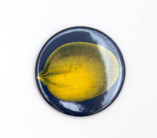 Blue fridge magnet with illustration of a lemon